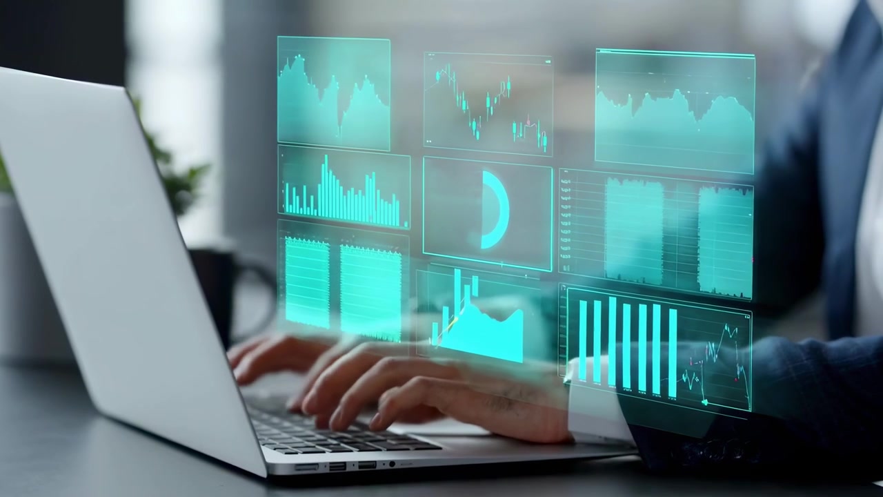 Business Professional Analyzing Financial Data on Laptop with Holographic Interface