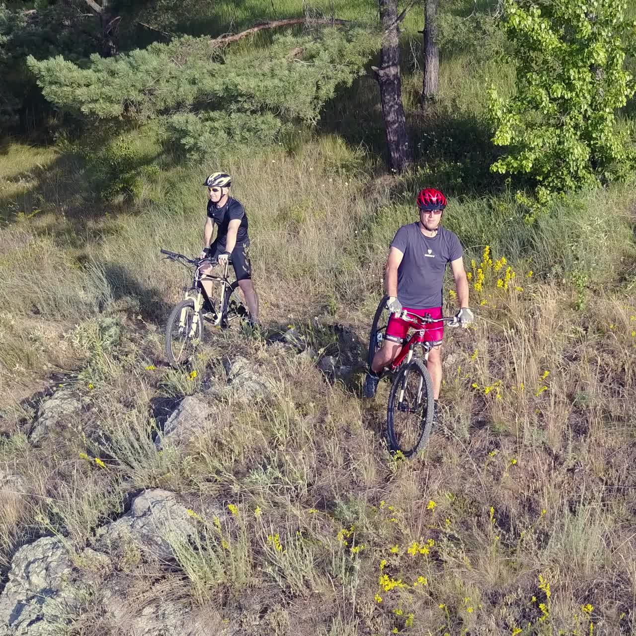 Men Running On A Mountain Bike