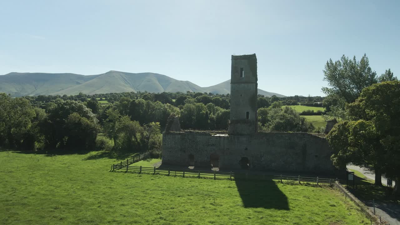 Flying Through The Remains Of Moor Abbey Franciscan Friary In Galbally, County Tipperary, Ireland. Aerial Drone Shot