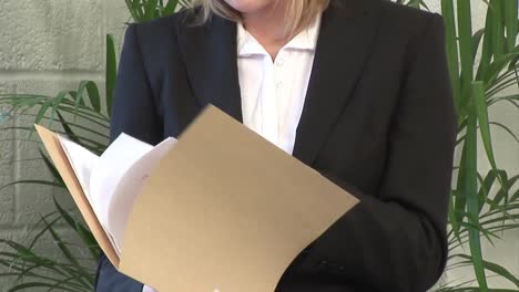 business woman examining a document