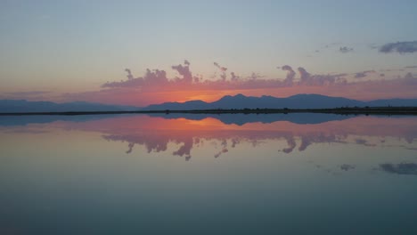 aerial view of a swamp oasis in the mexican desert of cuatro cienegas in coahuila. sky with clouds reflected on water. ramsar protected area.