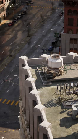 high angle view of city rooftop with cooling tower