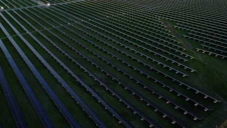 Aerial-view-of-solar-farm-harmoniously-blending-into-industrial-landscape