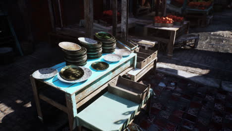 market stall with plates and ceramic tableware