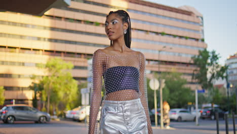 stylish brunette model strolling alley closeup.  lady looking camera