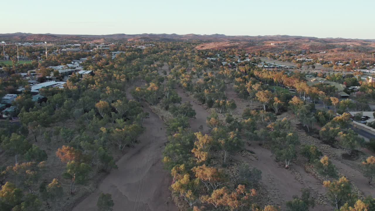 Lowering drone footage along the Todd RIver in the late afternoon. Alice Springs, Mparntwe, Northern Territory, Australia. August 2022.