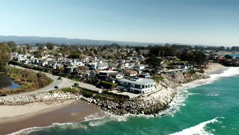 Drone-view-of-waterfront-homes-in-Santa-Cruz,-CA