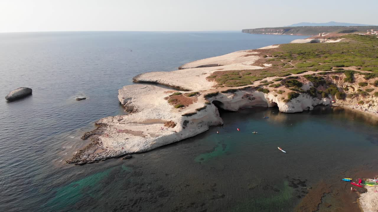 Aerial: circular shot of s'Archittu in the west coast of Sardinia