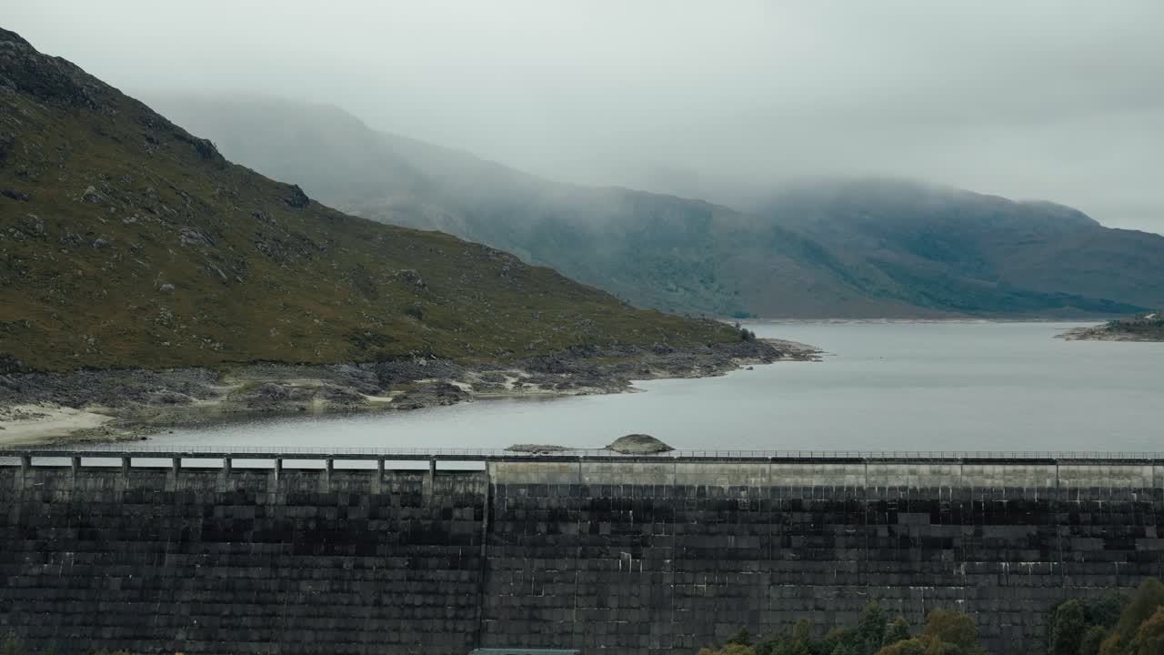 Scottish Dam and Lake Landscape in the Fog