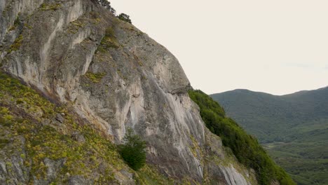 Aerial-view-of-people-climbing-on-rock