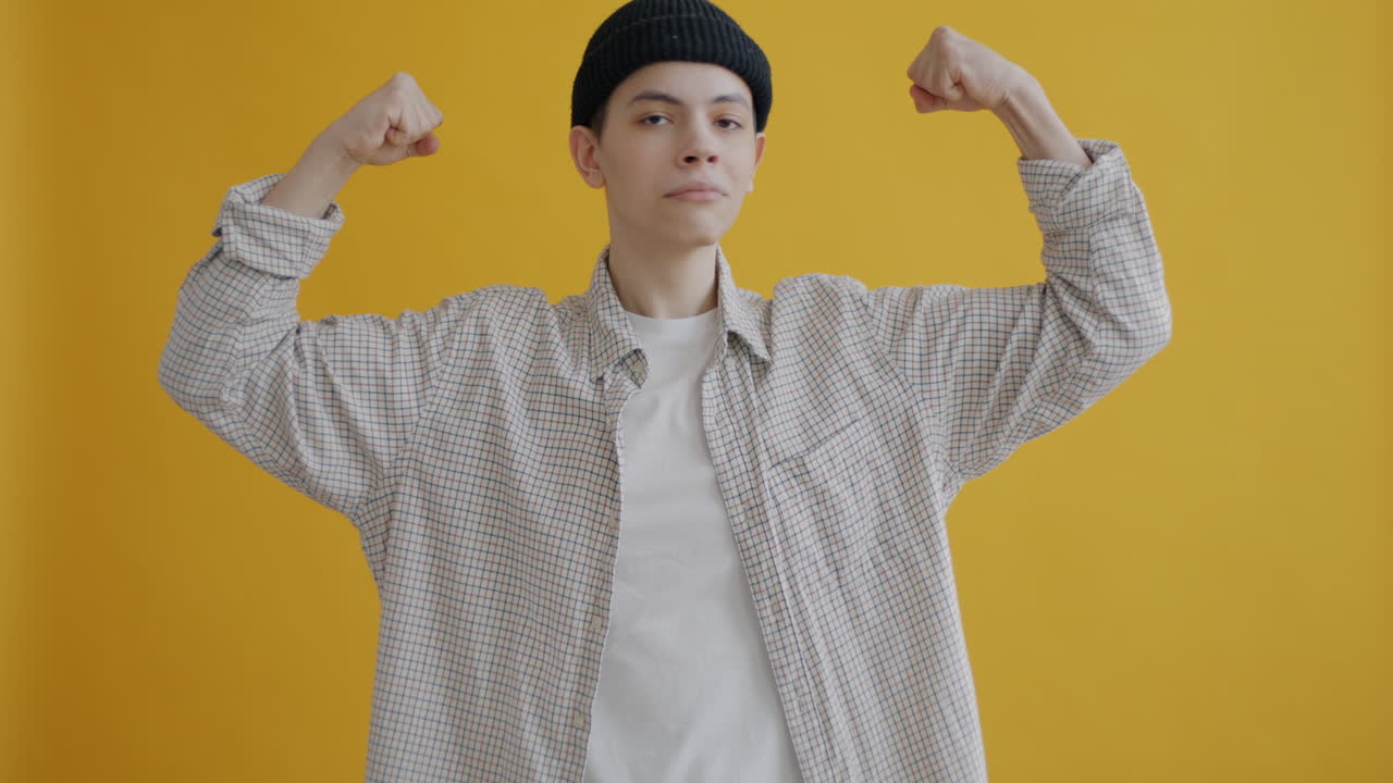 Teenager Posing in Plaid Shirt and Beanie