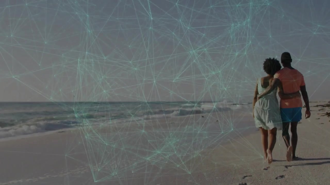 Couple starting right walking arm-in-arm sharing love along beach leaving prints tech mesh shifting
