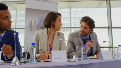 Business-people-sitting-at-the-speaker-table-in-seminar-4k