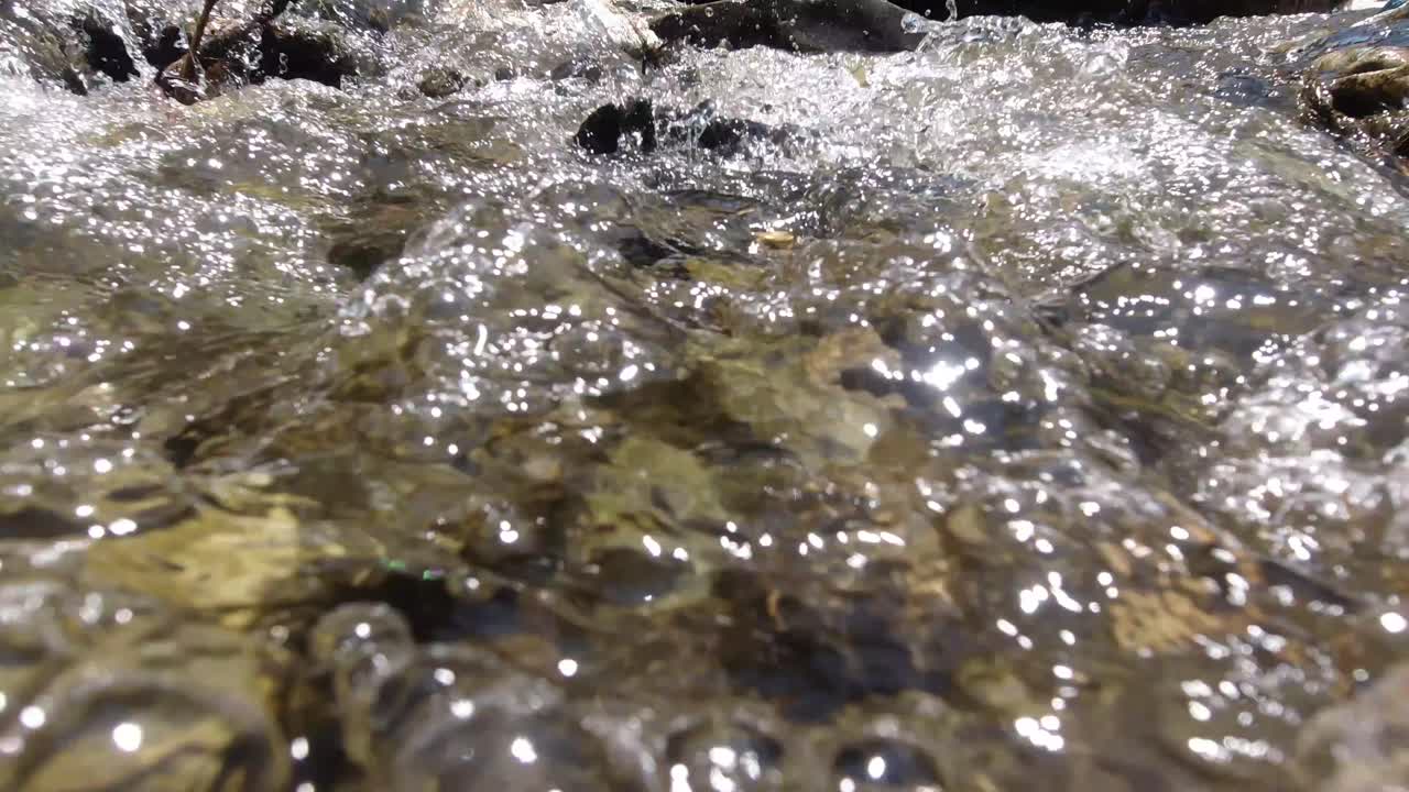 Water is flowing over the stones.