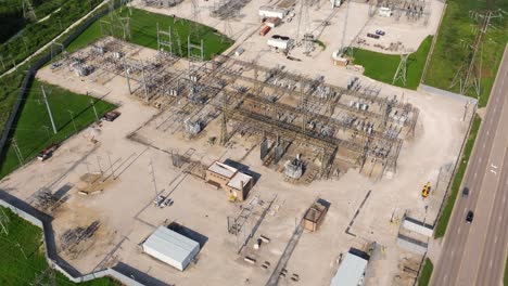 electricity power plant - aerial drone view above electrical substation