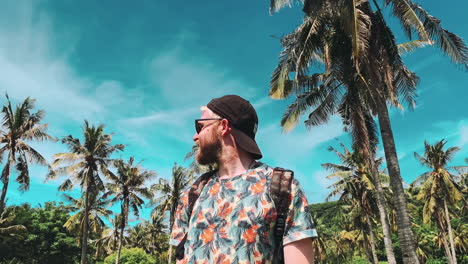 happy man enjoying amazing tropical on background nature landscape
