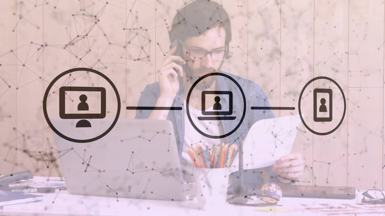 Man holding phone typing starting network overlay linking devices while checking docs for business