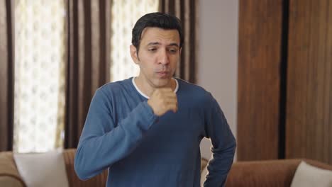 indian man coughing and sneezing