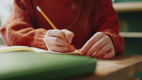 student taking notes