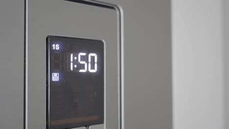 closeup of a microwave timer