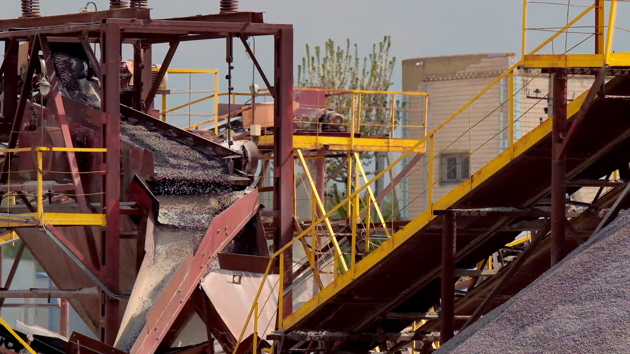 Close up of quarry equipment. Quarry aggregate with heavy duty machinery