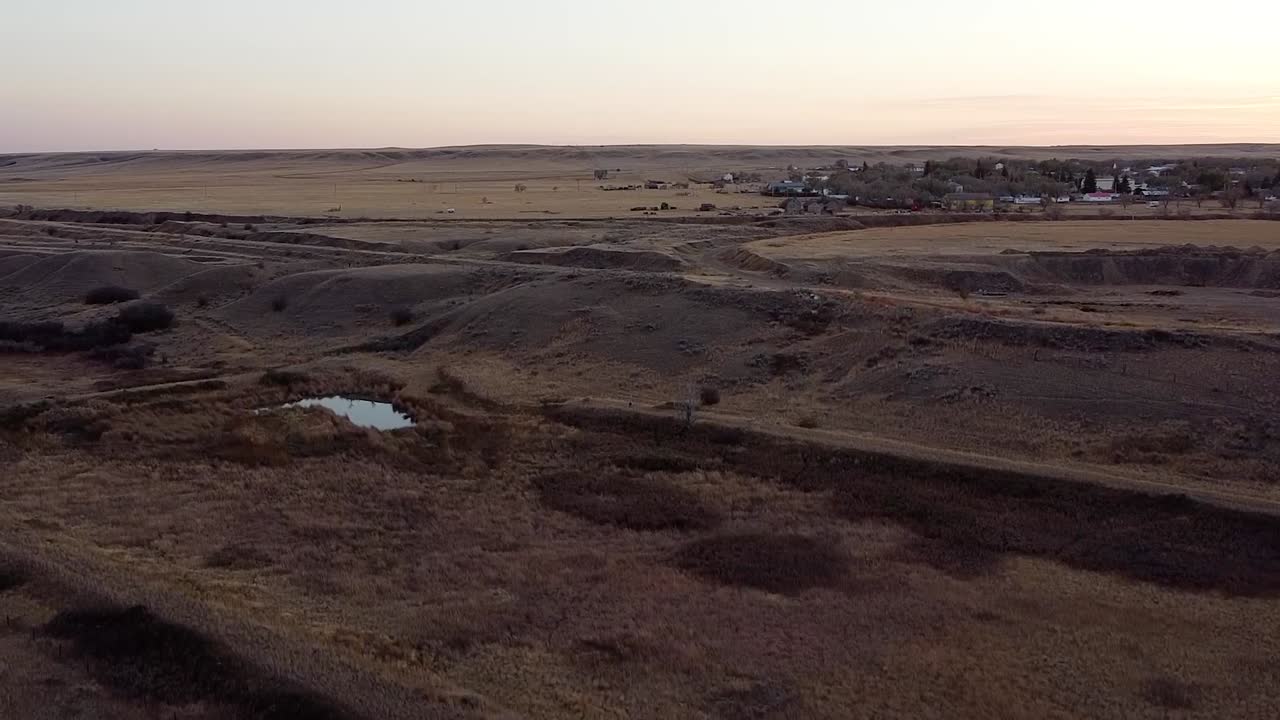 Drone footage country over prairie land near Alberta Canada