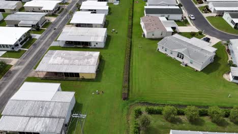 aerial view of a mobile home park and residential neighborhood