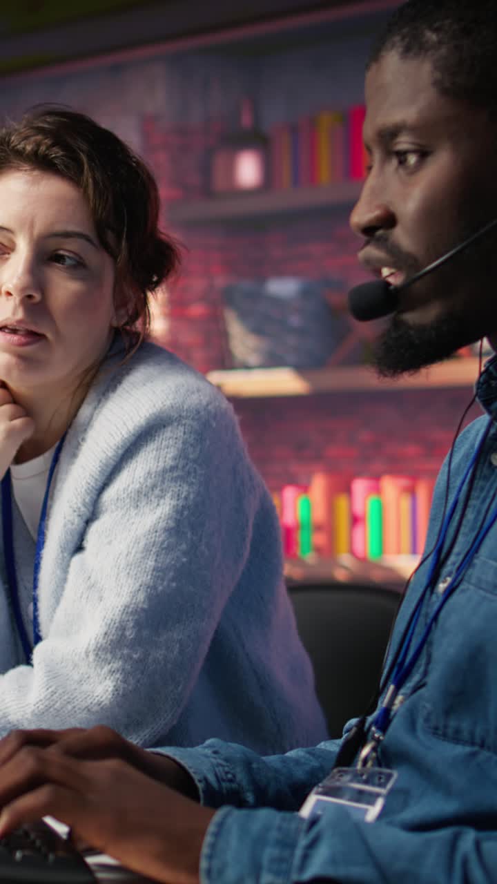 Vertical video Call center manager doing training for worker providing live chat support