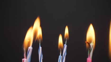 slow motion of camera going away from birthday candles