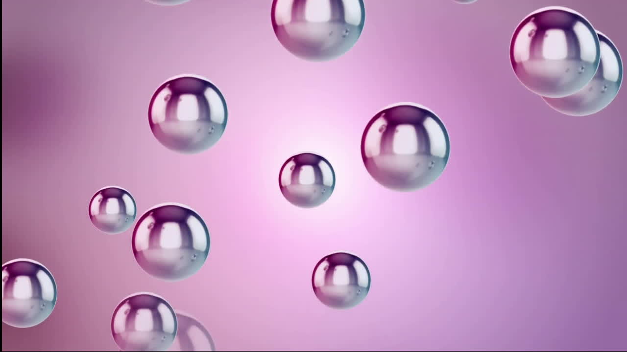 Animation of glass balls over pink background