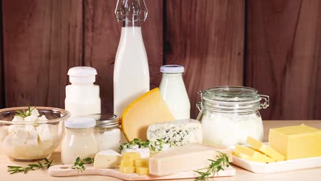 assorted dairy items displayed on wooden surface