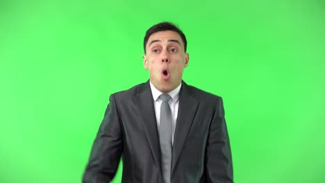 businessman expressing diverse emotions on green screen