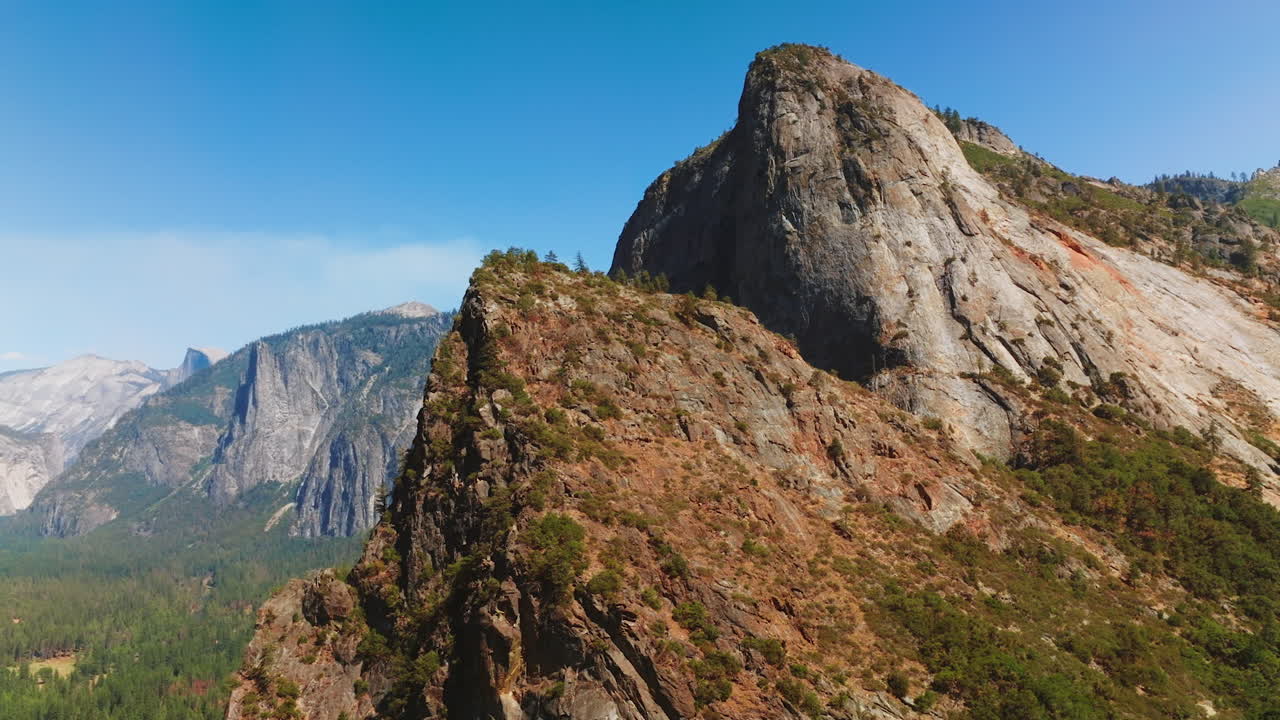 Breath-taking view of mountains in Yosemite National Park, California, USA. Splendid rocks and cliffs at backdrop of blue clear sky.