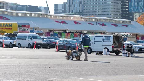 workers preparing market stalls in melbourne