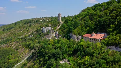 historical architecture located on hills. panoramic view of buildings in the mountains with green areas in summer. aerial view.