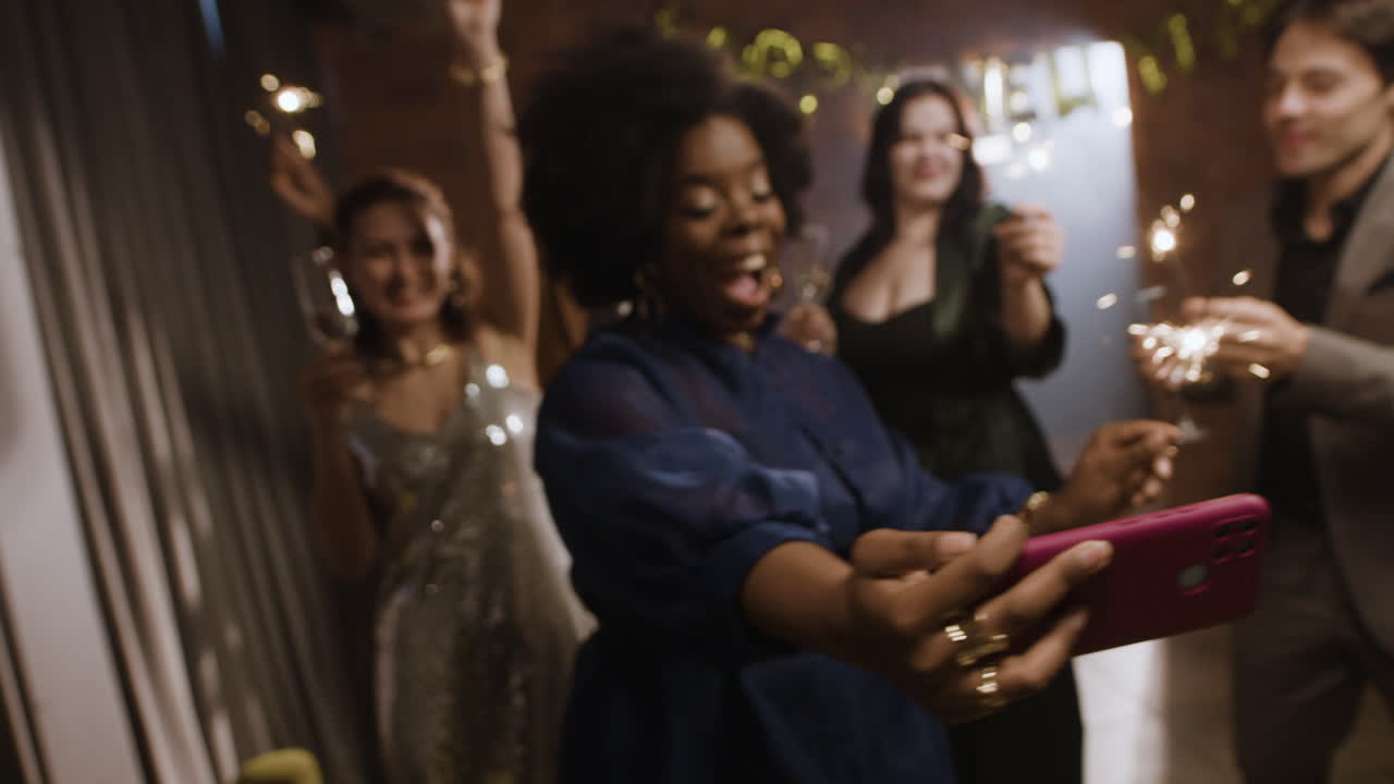 Friends celebrating with sparklers