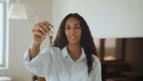 woman with keys of new house