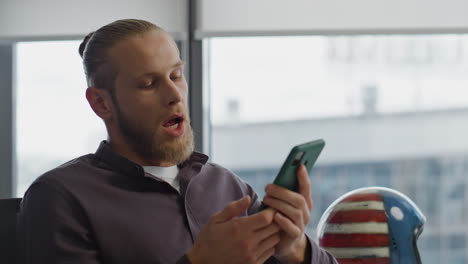 angry business man ending call workplace portrait. nervous guy bad conversation