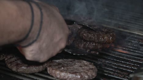 grilling burger patties on a hot grill