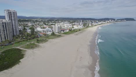 white sand beach at palm beach in gold coast, queensland, australia - aerial drone shot