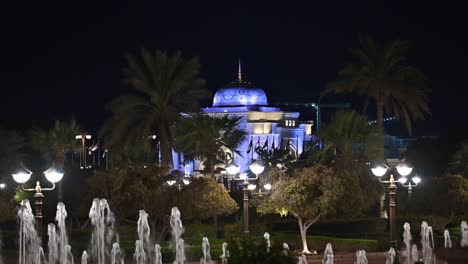 Emirates Palace Hotel lights up the Abu Dhabi skyline at night in the UAE