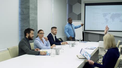 african american man explaining business presentation at meeting