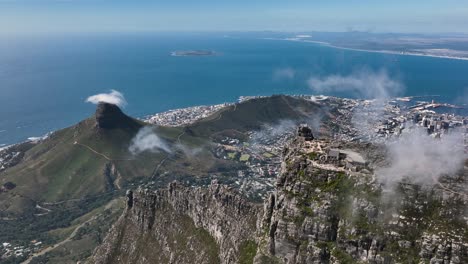 beautiful cinematic aerialdrone shot of table mountain and cape town city