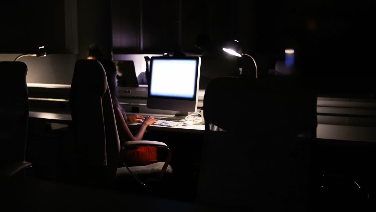 Female executive working at desk