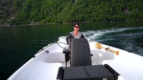 woman driving a motor boat