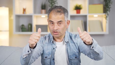 man giving motivational speech to camera.