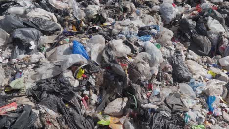 close-up of waste not suitable for recycling in a dumping ground