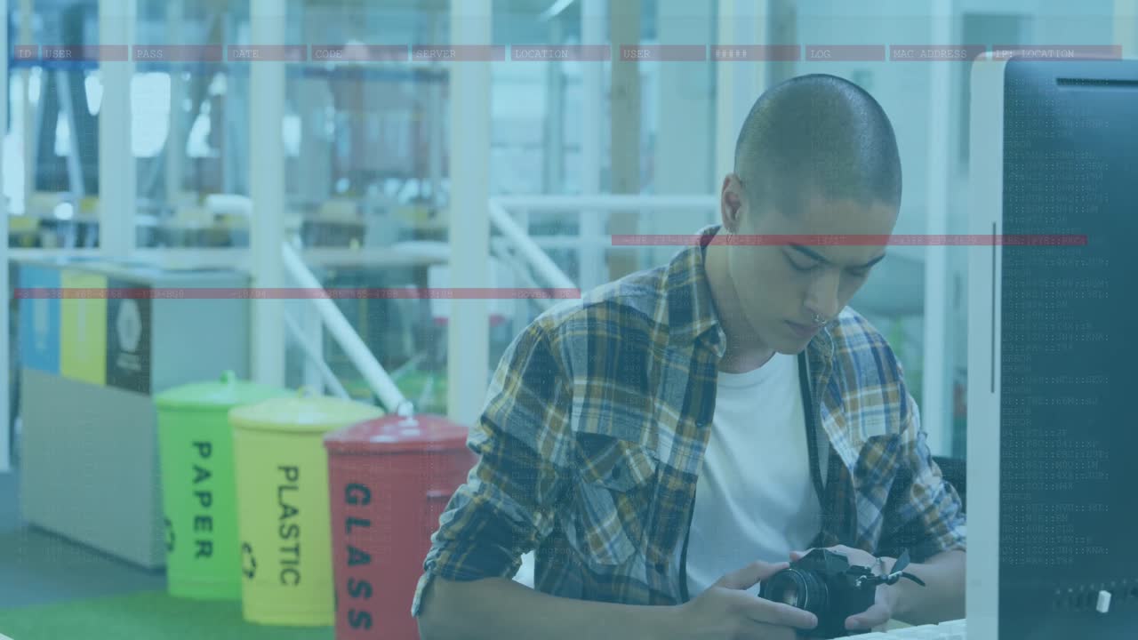 animación de procesamiento de datos sobre fotógrafo masculino biracial usando cámara digital y computadora.