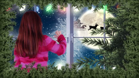 chica saludando a santa trineo y renos por la ventana