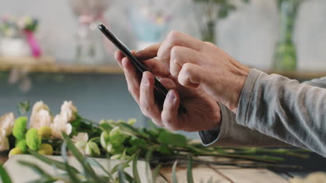 florist scrolling feed on smartphone